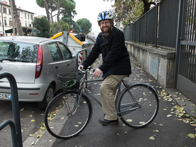 Joshua Granberg riding a bike in Florence, Italy.